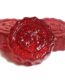 Red hard candies infused with 200mg THC, potent cannabis edible for stress and pain relief